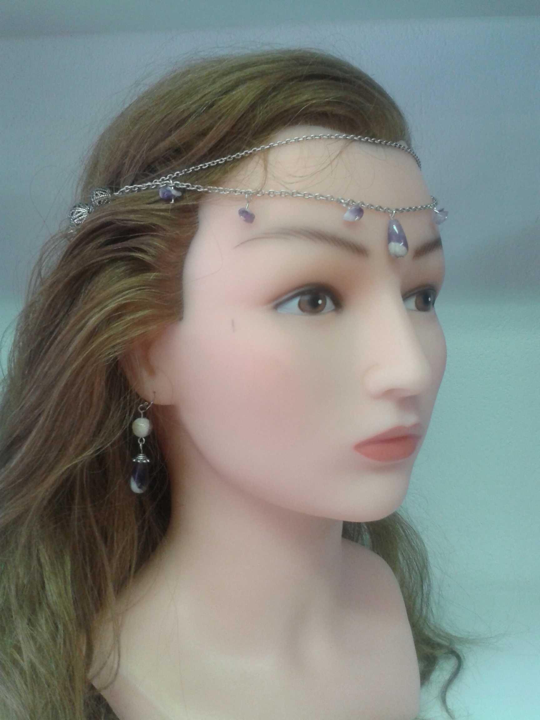 Headband ajustable compos&eacute; de perles filigran&eacute;es et jolie fleur de m&eacute;tal argent&eacute;